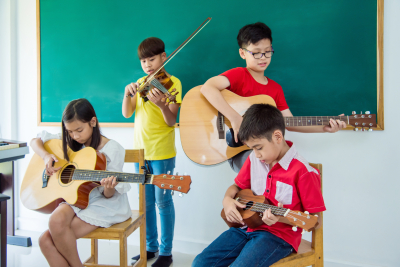 children playing music instruments